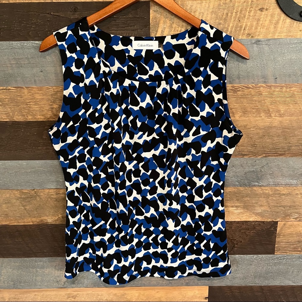 Calvin Klein- sleeveless blouse black and blue, size M, fitted.